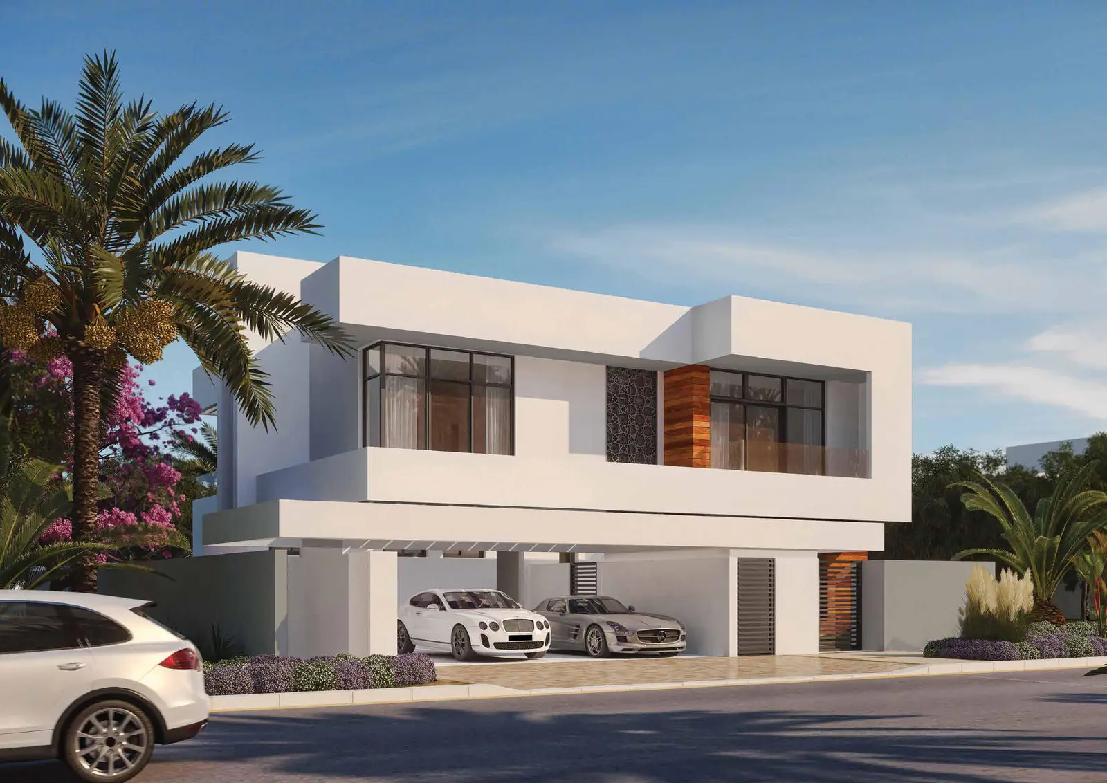 Side view of 4-bedroom villa in West Yas, Yas Island, Abu Dhabi showing private entrance and landscaped front yard