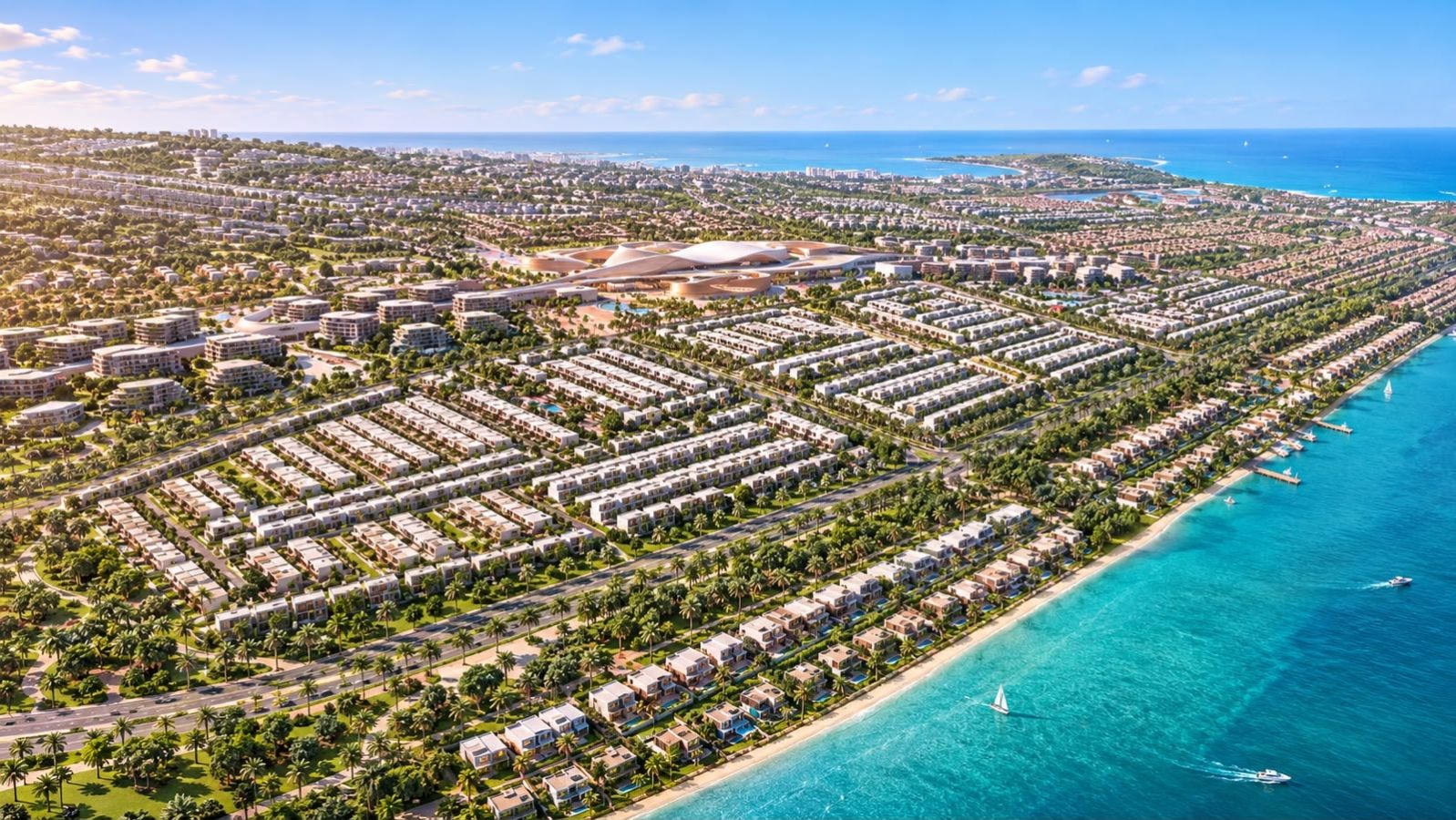 Waterfront promenade view of Wadeem Gardens featuring landscaped walkways, leisure zones, and modern community architecture.