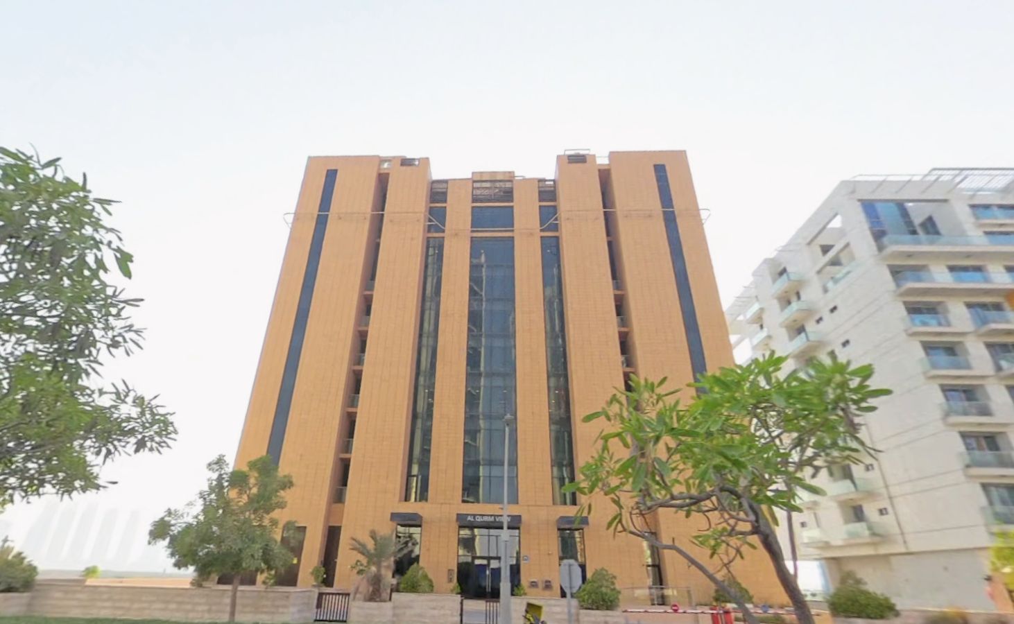 Modern low-rise exterior architecture of Al Qurm View building in Shams Abu Dhabi on Al Reem Island overlooking natural mangroves