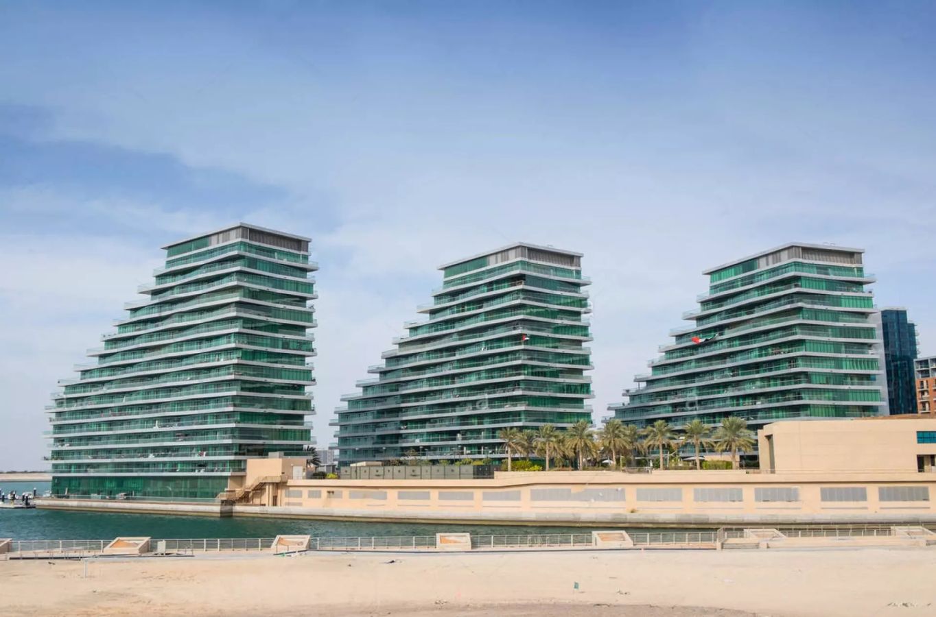 Al Jawzaa Tower residential building featuring modern apartments in Al Raha Beach, Abu Dhabi.